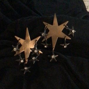 Show off your star power! Polished copper earrings w/crystals in dangling stars!